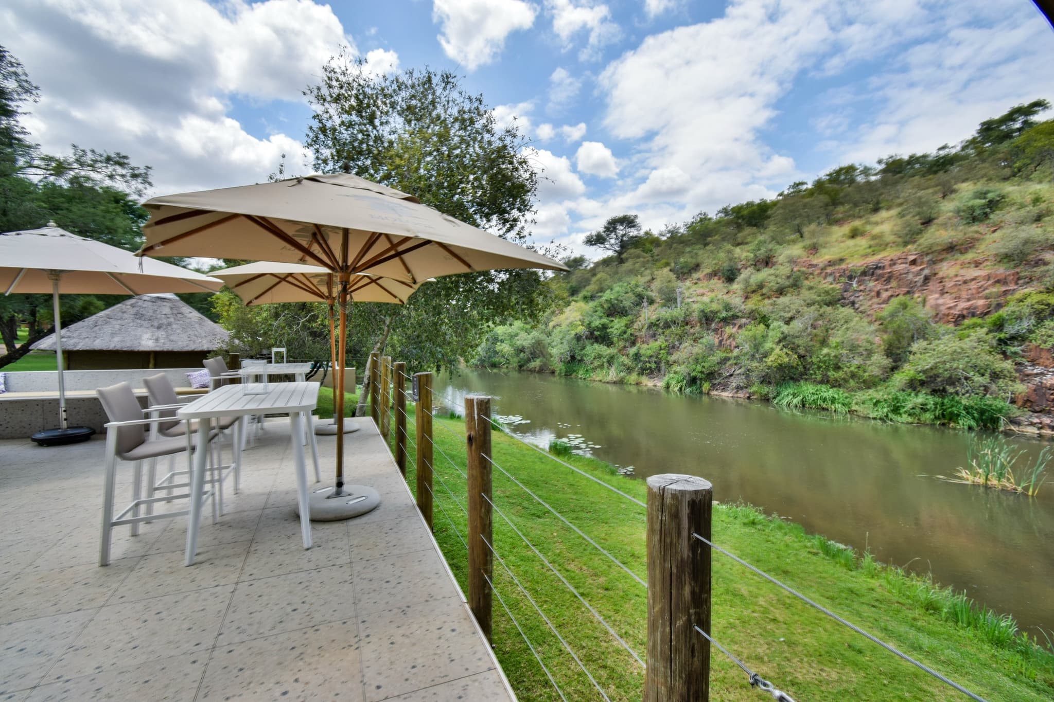 Riverside dining terrace with river views